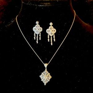 Stunning white gold and diamond pendant and Locket Charm Bracelet.